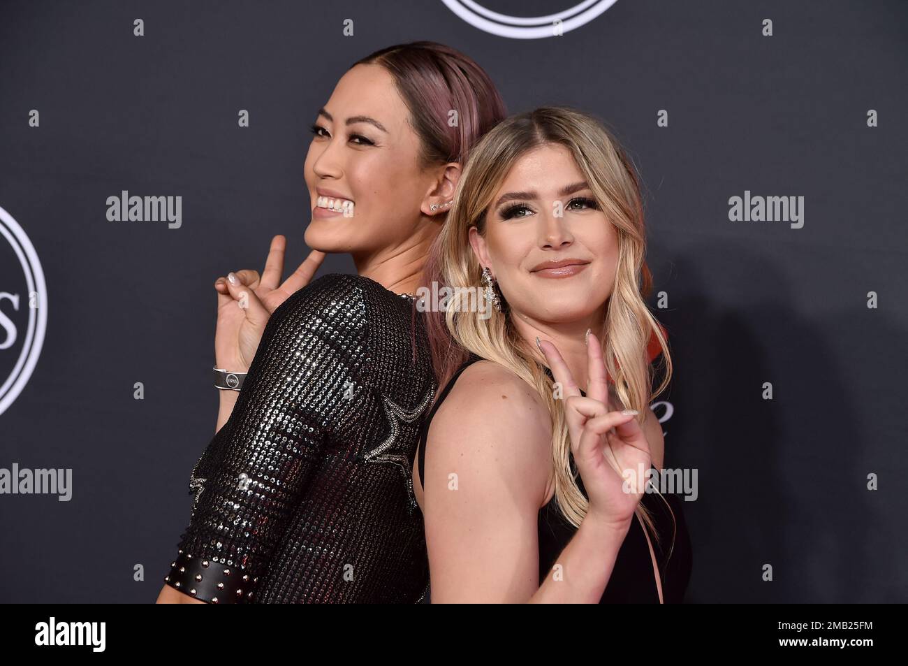 Golfer Michelle Wie West, left, and tennis player Eugenie Bouchard