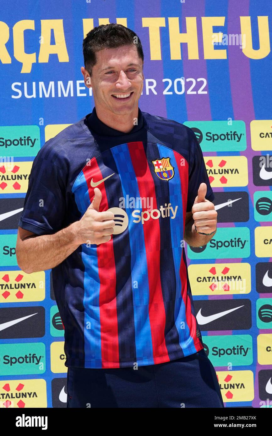 Robert Lewandowski wears his new FC Barcelona soccer jersey, Wednesday