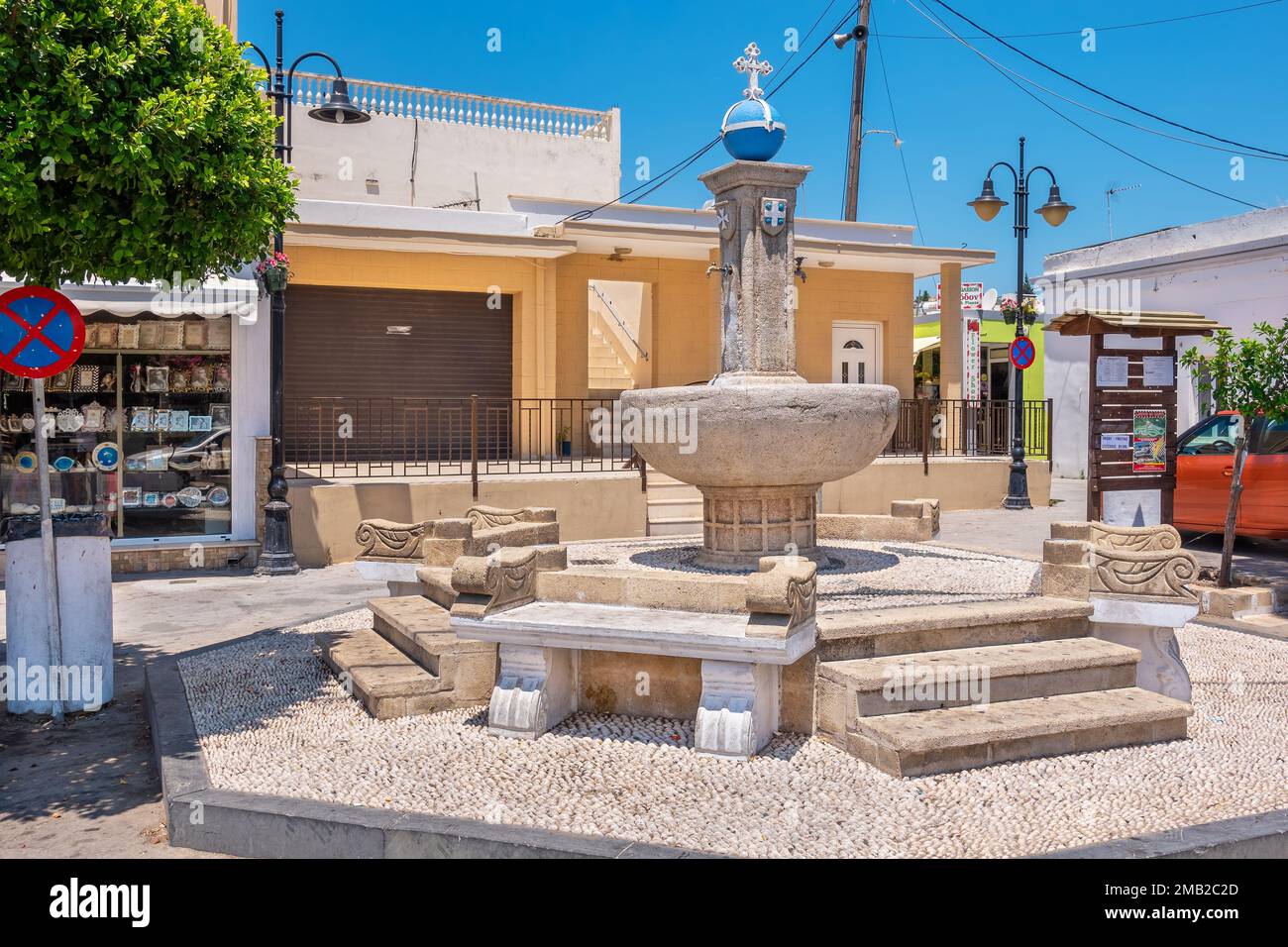 View of fountain (water spring) on square at Lardos village. Rhodes Island, Greece Stock Photo