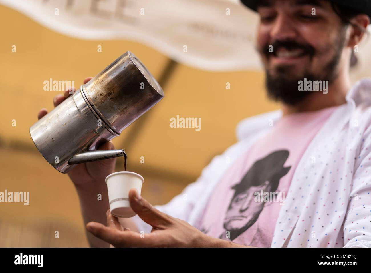 https://c8.alamy.com/comp/2MB2F0J/italy-campania-naples-giuseppe-schisano-is-a-28-years-old-neapolitan-who-sells-traditional-cuccumella-coffee-along-via-toledo-the-main-thorougfa-2MB2F0J.jpg
