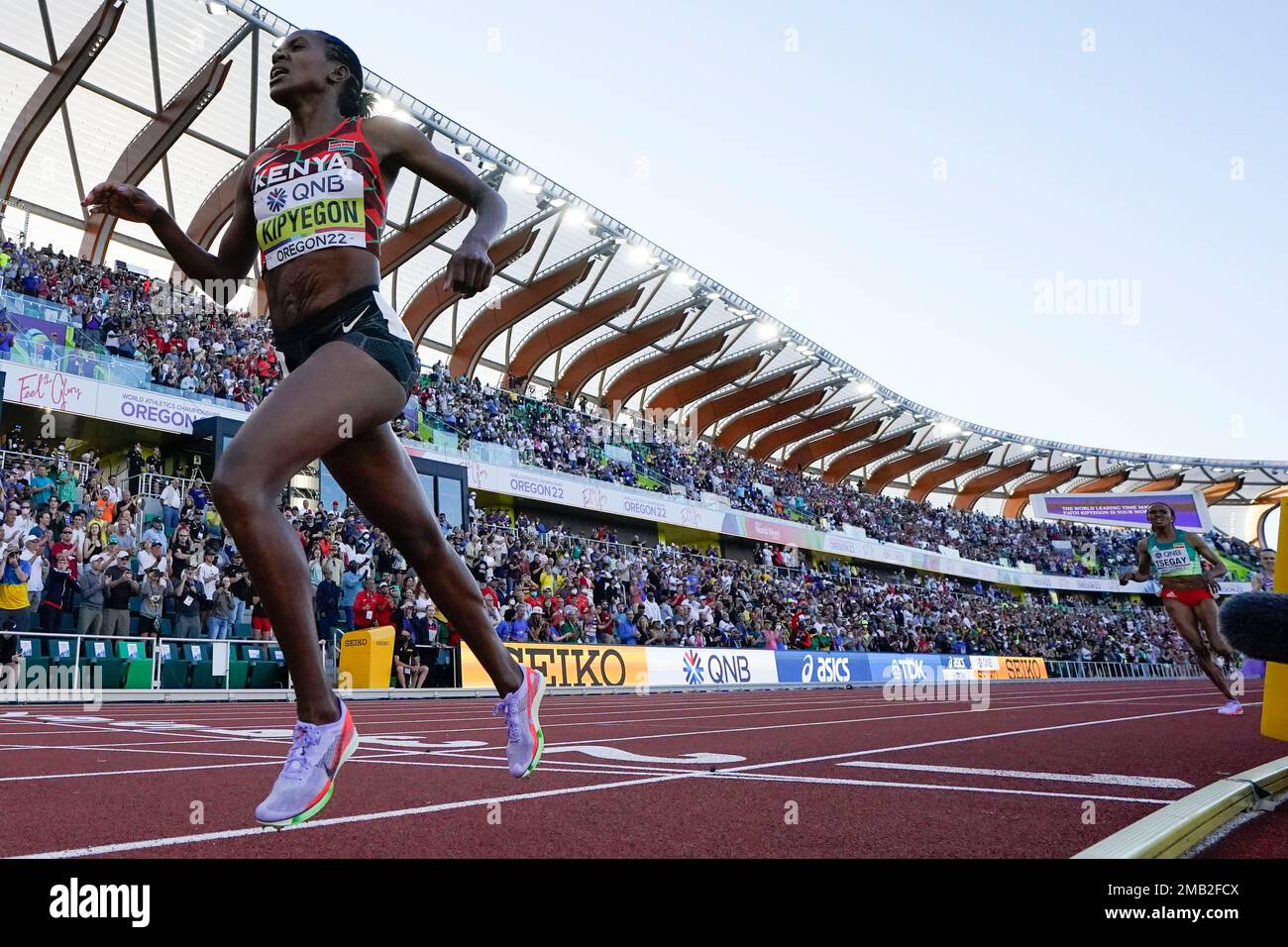 Faith Kipyegon, of Kenya, wins the women's 1500meter run final at the