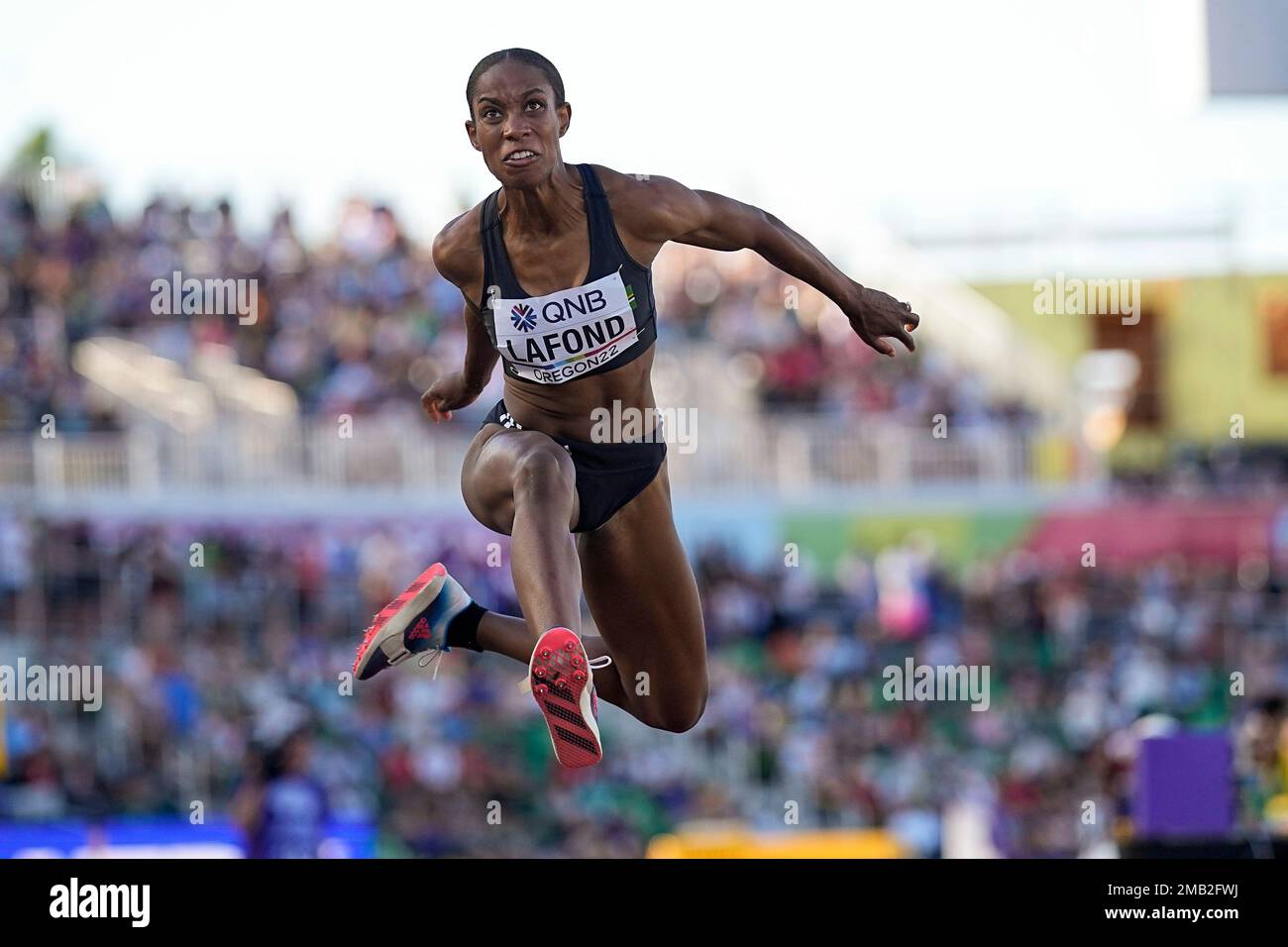 Thea Lafond, of Dominica, competes during the women's triple jump final