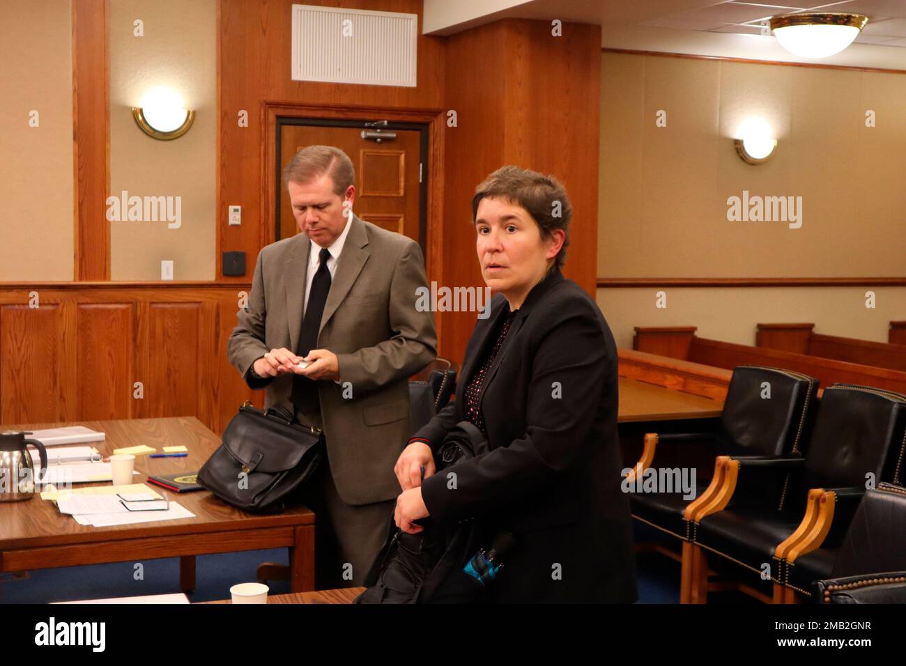 Attorneys Curtis Capehart, left, deputy attorney general for the West