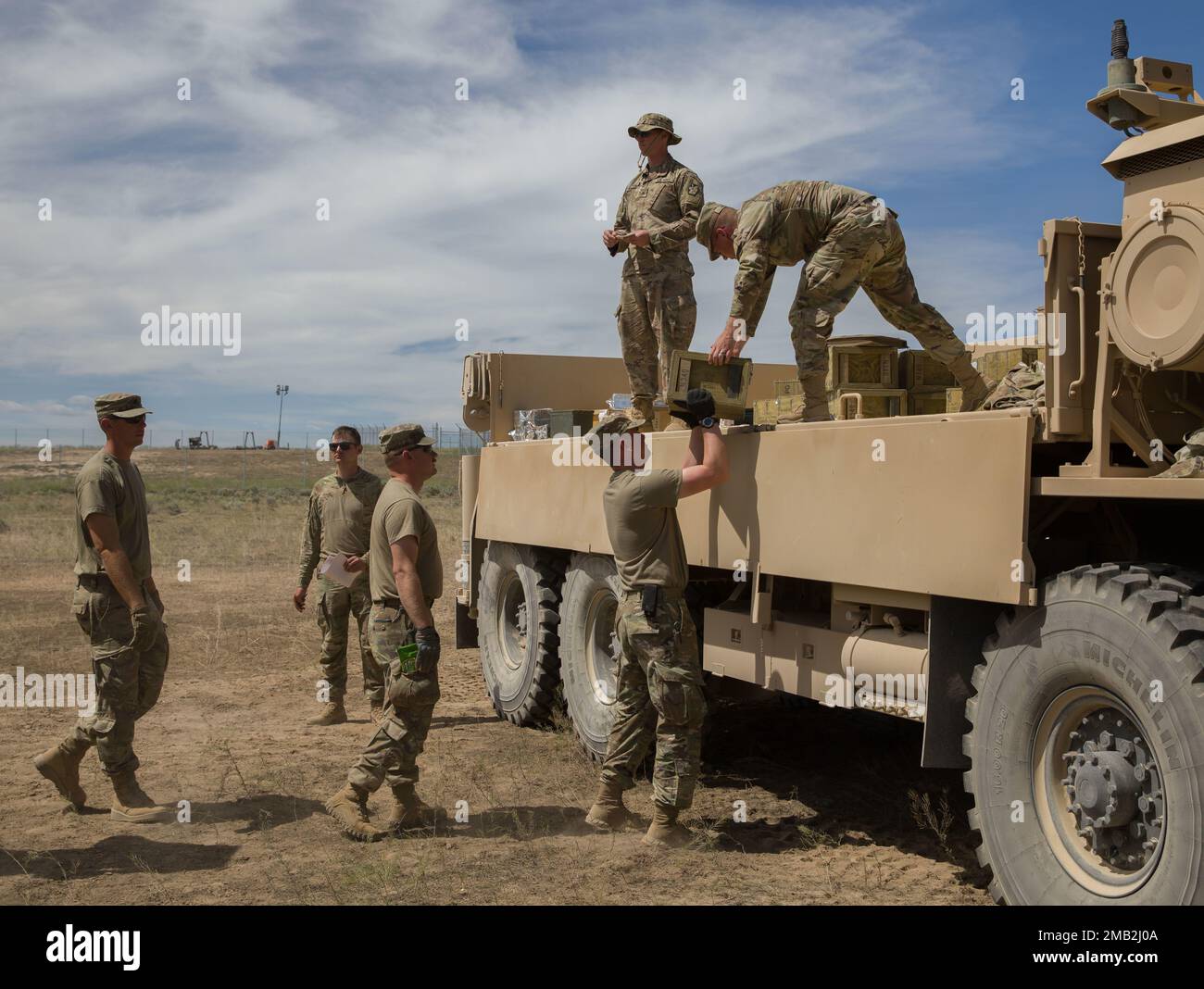 Soldiers of the 213th Forward Support Company, 65th Field Artillery ...