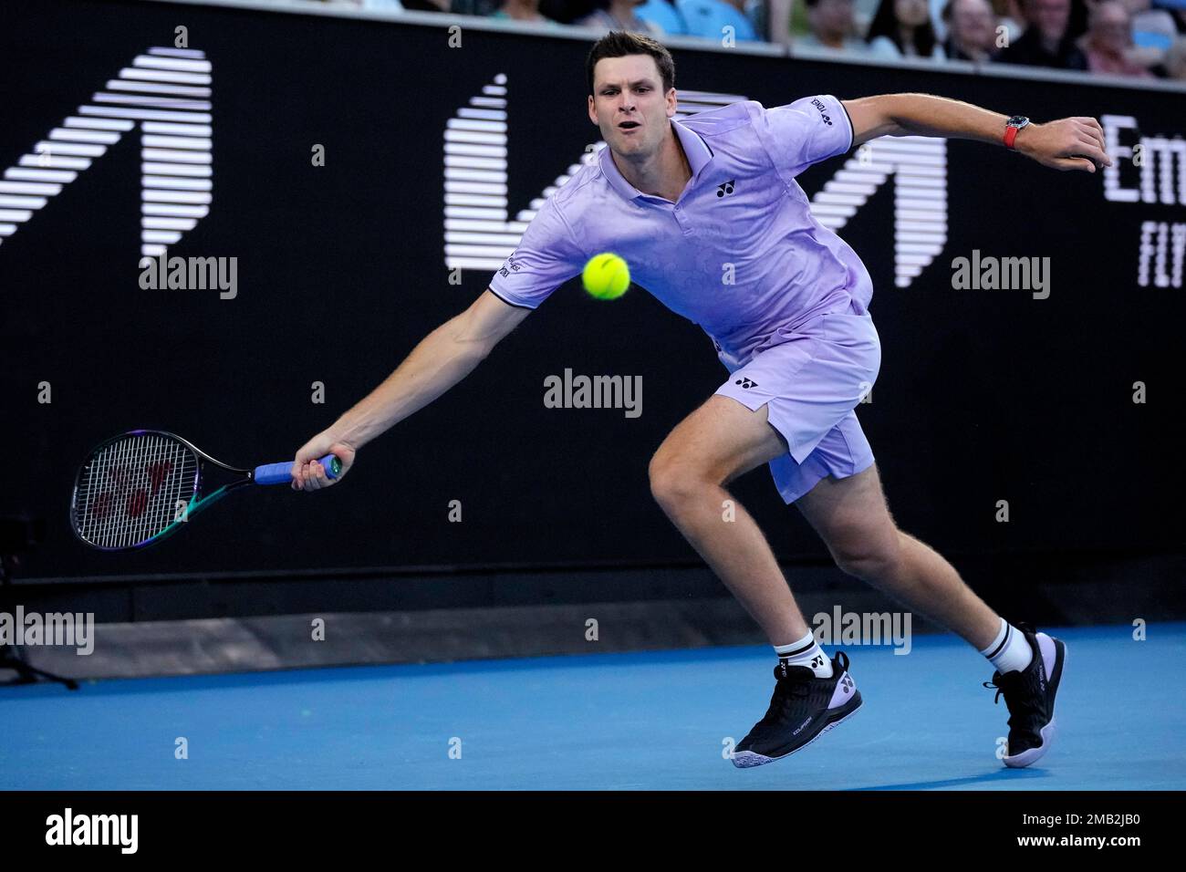 Hubert Hurkacz of Poland plays a forehand return to Denis Shapovalov of  Canada during their third round match at the Australian Open tennis  championship in Melbourne, Australia, Friday, Jan. 20, 2023. (AP