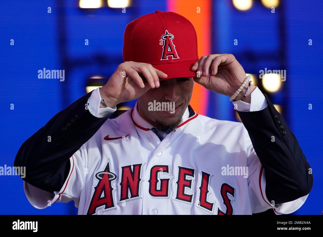 Zach Neto poses wears his new team's hat after being selected by the Los  Angeles Angels with the 13th pick of the 2022 MLB baseball draft, Sunday,  July 17, 2022, in Los