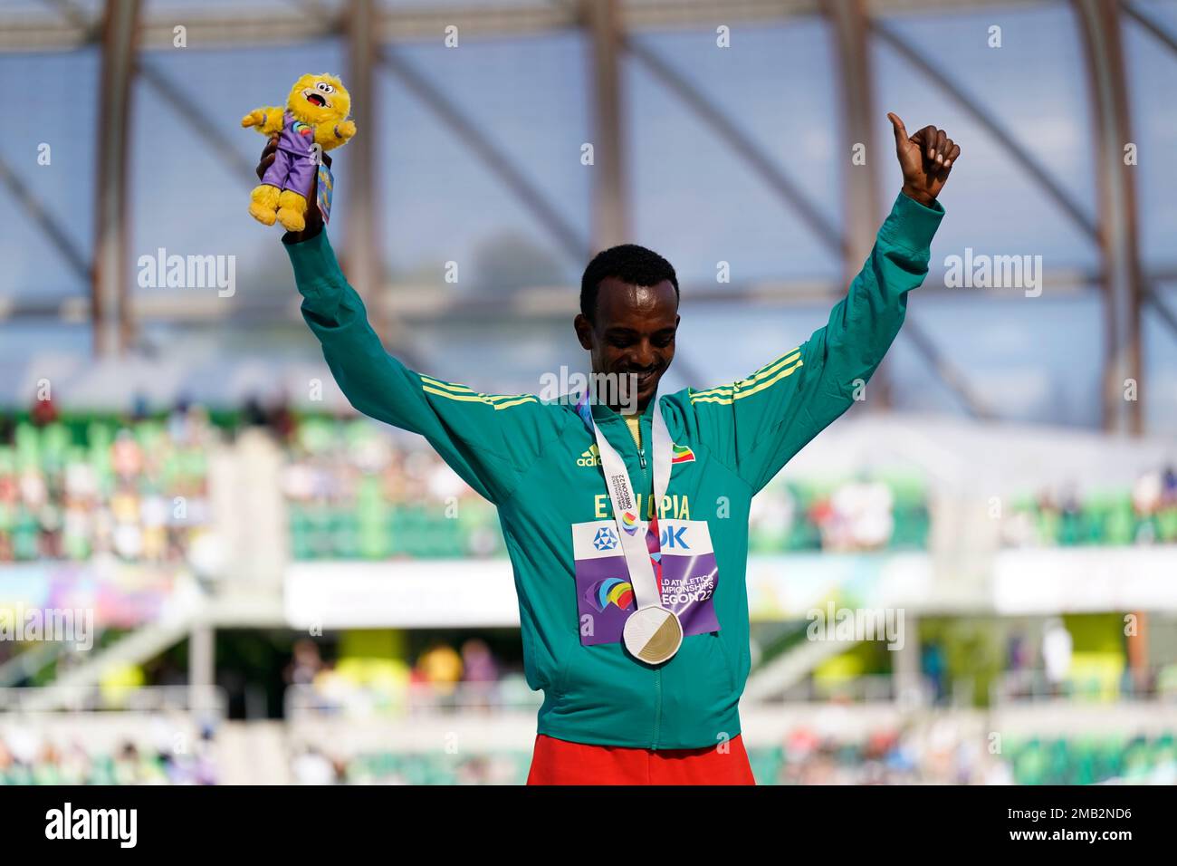 Gold medalist Tamirat Tola, of Ethiopia, after the men