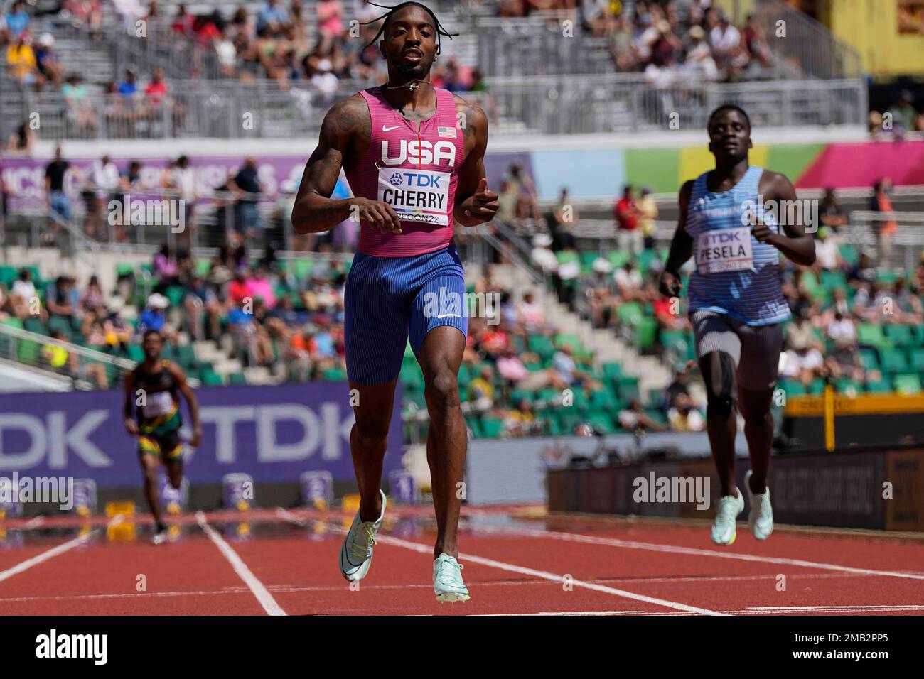 Michael Cherry, of the United States, wins a heat in the men's 400