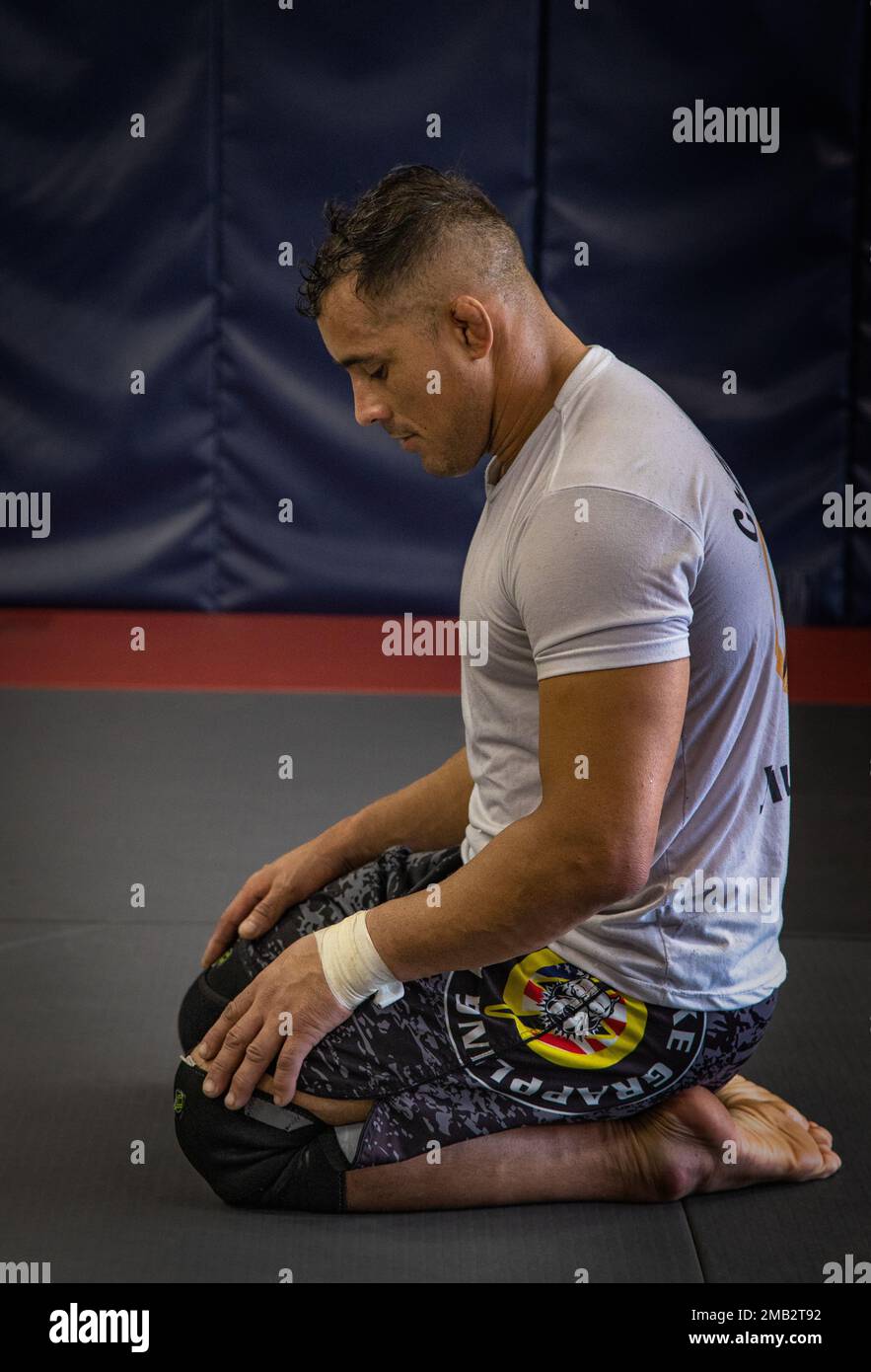 Alabama National Guard Pfc. Elioenai Campos stretches and practices