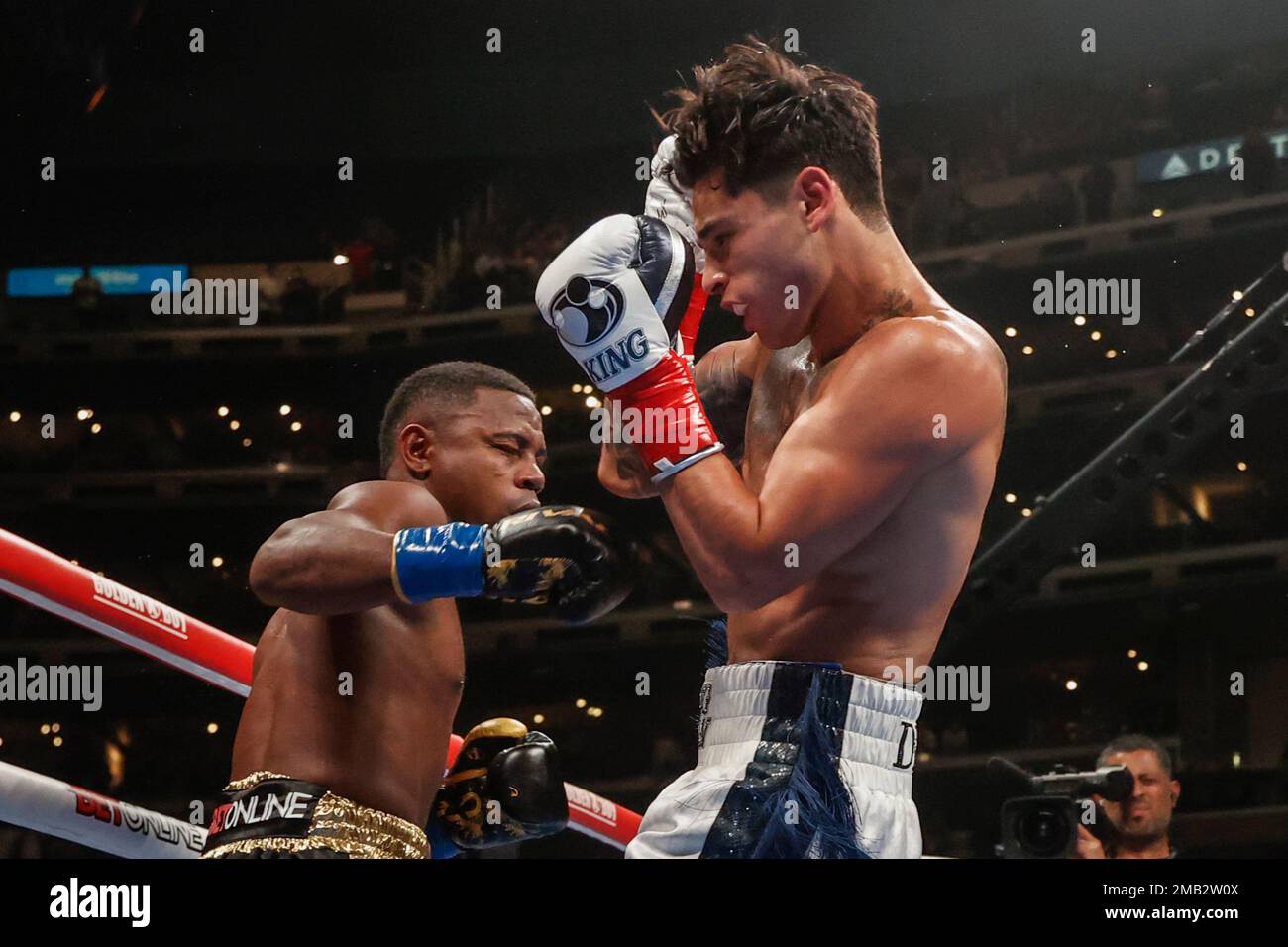 Ryan Garcia, right, and Javier Fortuna exchange punches during a lightweight boxing match Saturday, July 16, 2022, in Los Angeles