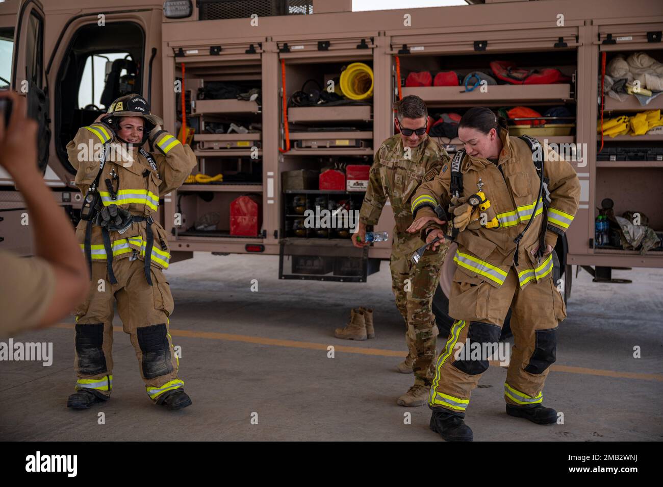 U.S. Air Force Senior Master Sgt. Natalie Semensow, left, first