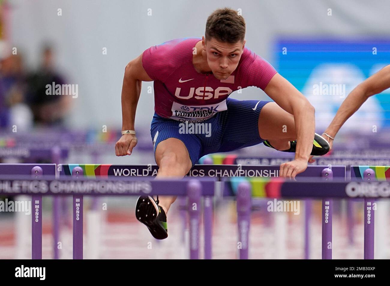 Trey Cunningham, of the United States, wins a heat in the mens 110