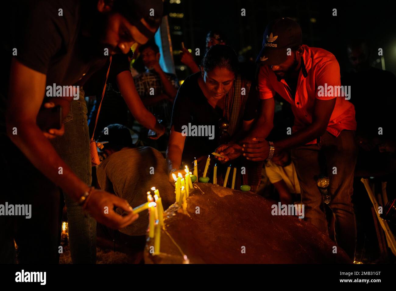 People Light Candles During A Vigil In Remembrance Of Those Who Died During The Recent Months Of 2658