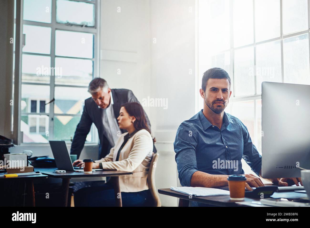 Portrait, office and business man by computer in company workplace. Pc ...