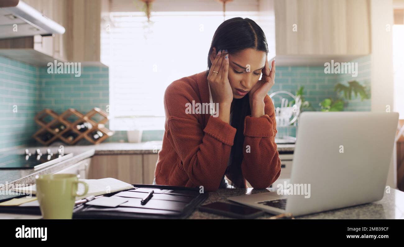 Staring at a screen first thing in the morning. a young businesswoman