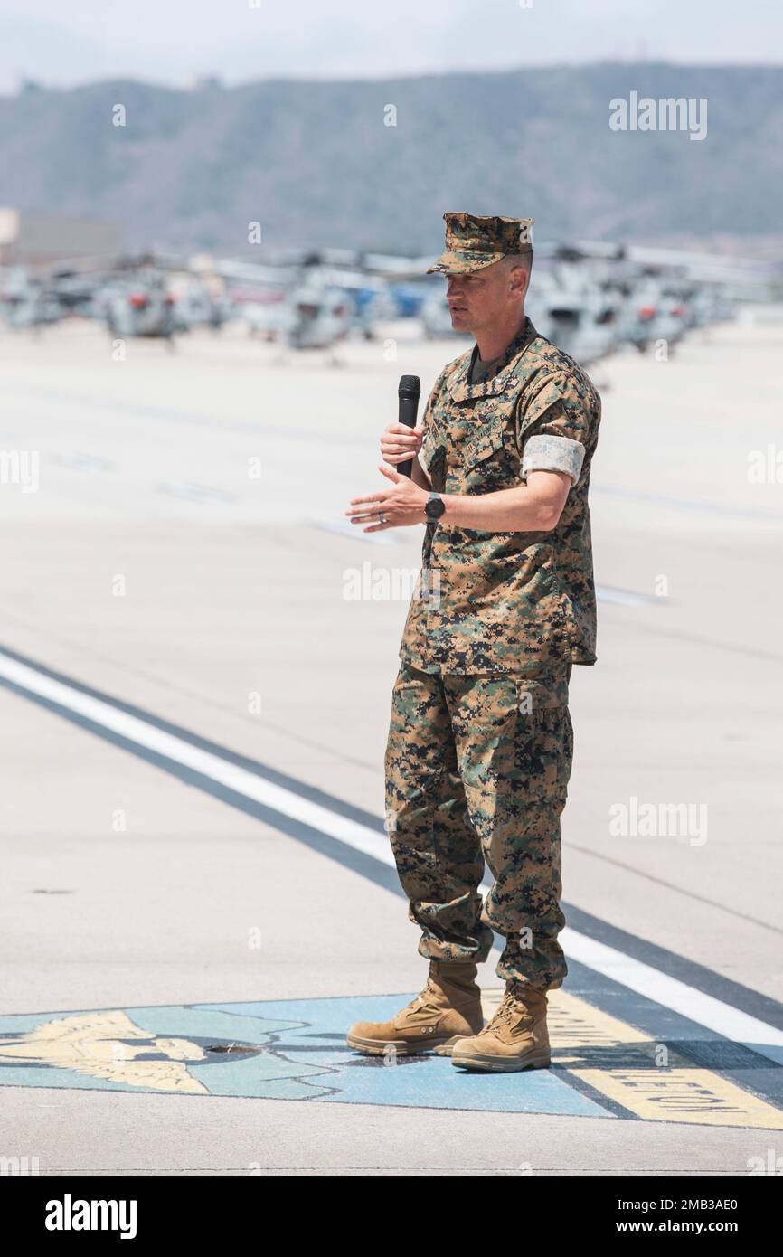 U.S. Marine Lt. Col. Stephen W. Borrett, the incoming commanding officer for Headquarters and Headquarters Squadron, Marine Corps Air Station Camp Pendleton, speaks to Marines, families and guests at a change of command ceremony on MCAS Camp Pendleton, California, June 10, 2022. During the ceremony, Borrett accepted command of H&HS from Lt. Col. Frank A. Savarese. The Marines of H&HS support other Camp Pendleton units with their airlift capabilities and ability to transport critical personnel and equipment. Borrett is a native of El Paso, Texas. Stock Photo