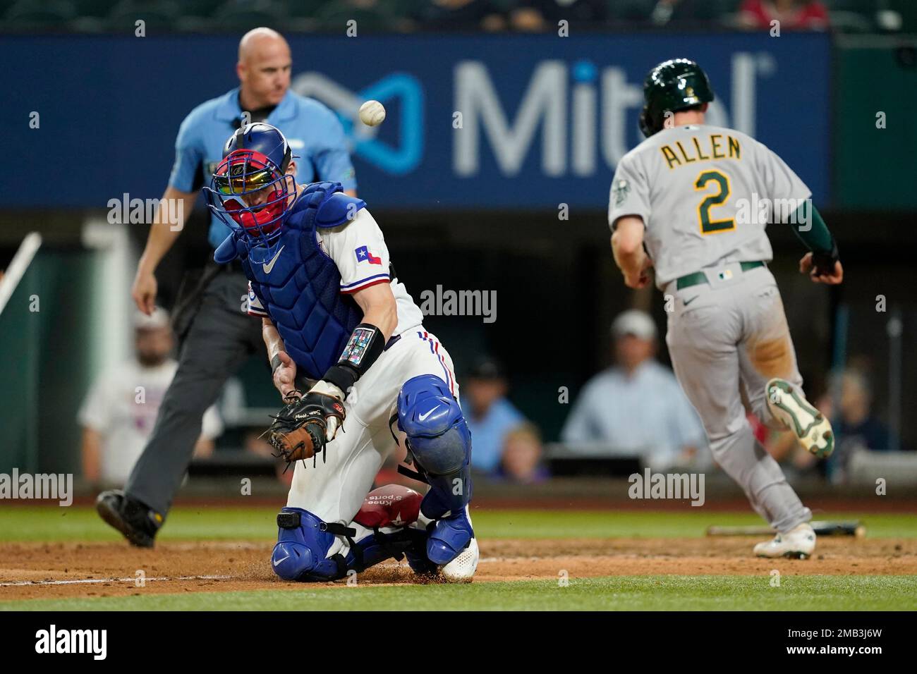 Gavin Ruffner The ball gets away from Texas Rangers catcher Sam Huff as Oakland ...