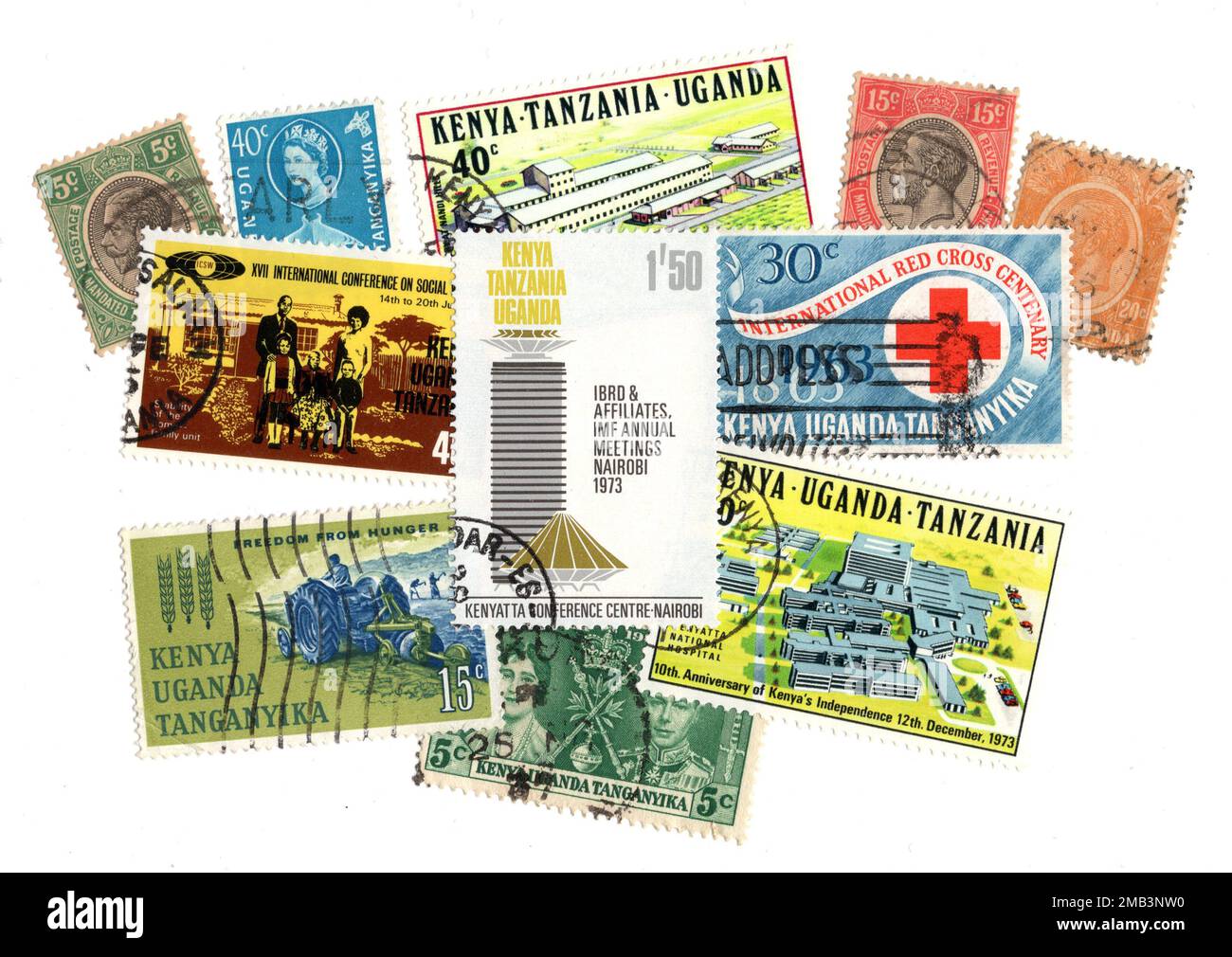 Vintage postage stamps from Kenya, Uganda and Tanganyika on a white