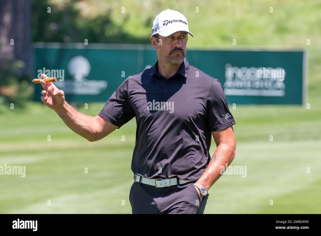 aaron rodgers tobacco Aaron Rodgers smokes a cigar walking down the 16th fairway during the first  round of the American Century Celebrity Championship golf tournament at  Edgewood Tahoe Golf Course in Stateline, Nev., Friday, July
