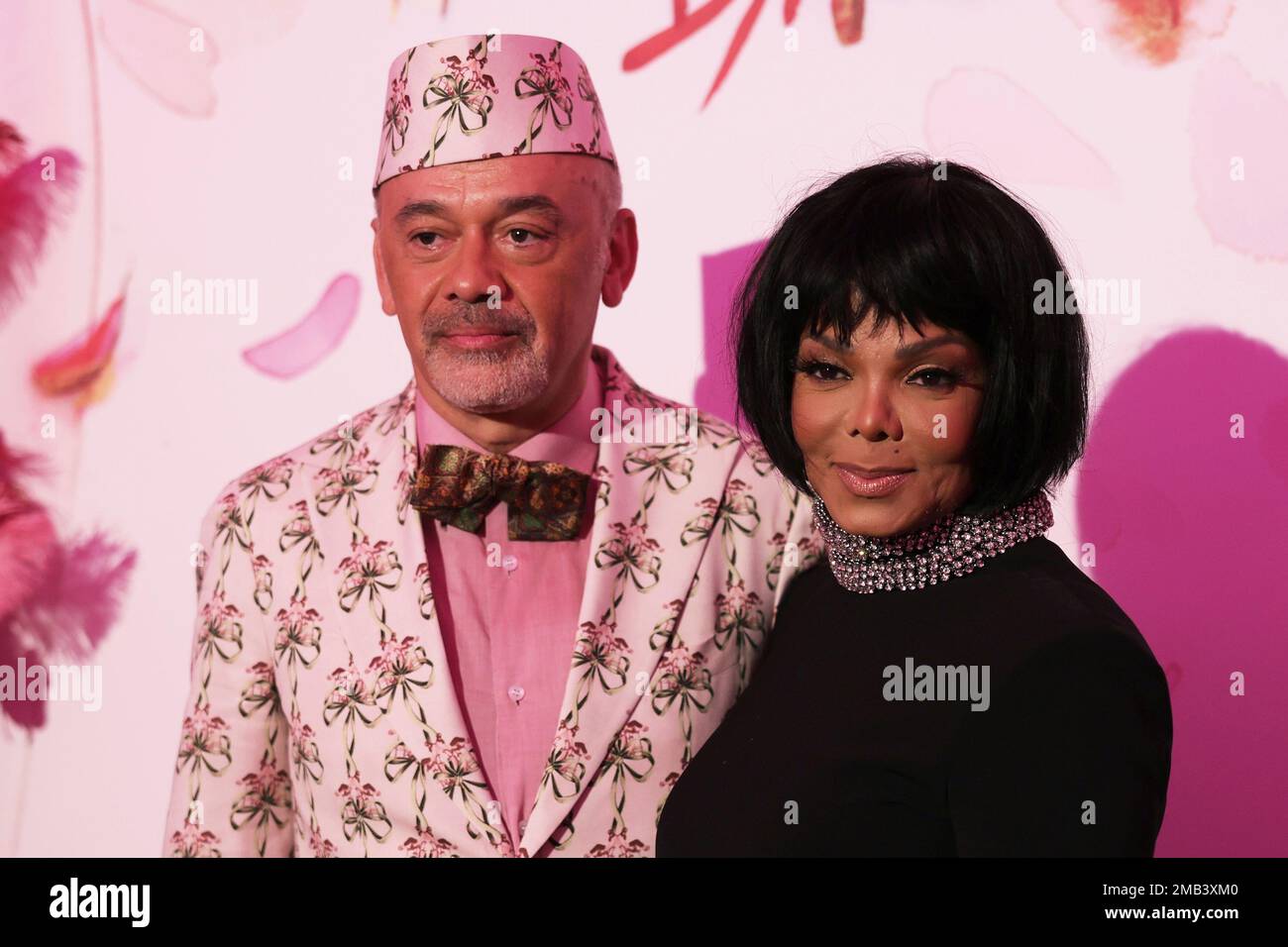 US singer Jackson and French designer Christian Louboutin pose