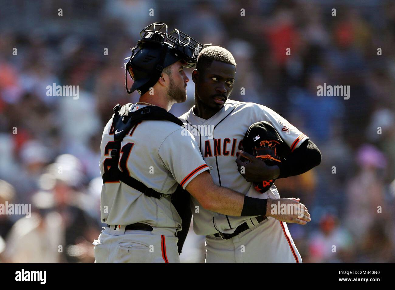 San Francisco Giants catcher Joey Bart, left, celebrates with pitcher  Yunior Marte after the team defeated the San Diego Padres in a baseball  game, Sunday, July 10, 2022, in San Diego. (AP