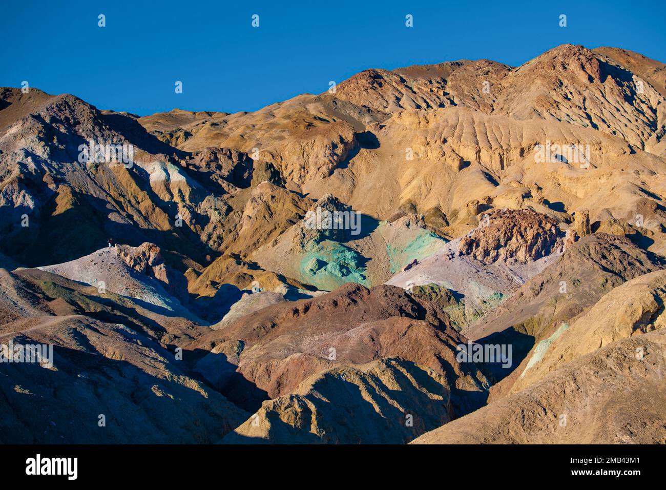 Artist's Palette rock discoloured by minerals in evening light, Death