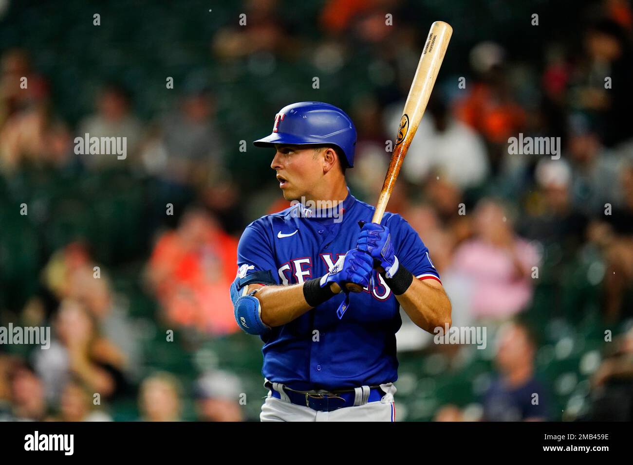 Texas Rangers' Nathaniel Lowe takes a swing during an at-bat in a baseball  game against the Seattle Mariners, Tuesday, May 9, 2023, in Seattle. The  Mariners won 5-0. (AP Photo/Stephen Brashear Stock