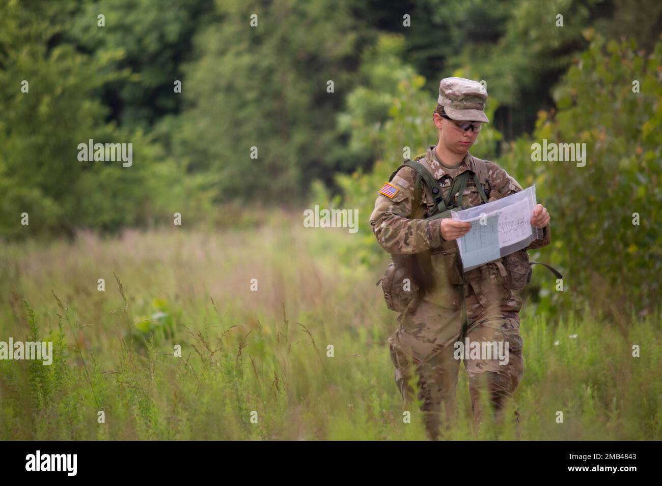 Cadets from 3rd Regiment, Advanced Camp, complete the land navigation course during Cadet Summer Training (CST) at Fort Knox, Ky., June 11, 2022. Using a protractor, compass, and map, Cadets are given six points to plot and locate on the course. | Photo by Courtney Huhta, CST Public Affairs Office Stock Photo