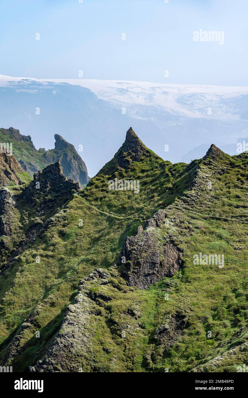 Pointed Ridge Pointed green mountain peaks on the ridge of Tindfjoell, Myrdalsjoekull ...
