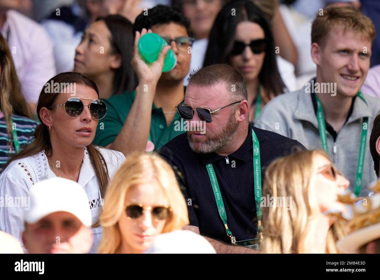 Former England soccer star Wayne Rooney and his wife Colleen watch Serbias Novak Djokovic play Britains Cameron Norrie in a mens singles semifinal on day twelve of the Wimbledon tennis championships in