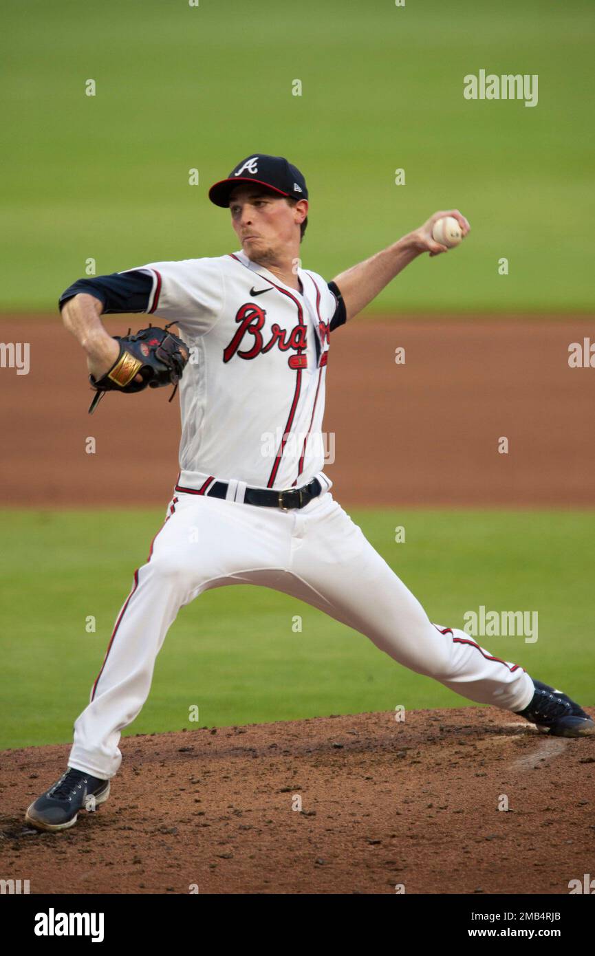 Atlanta Braves pitcher Max Fried throws to a St. Louis Cardinals batter  during the third inning of a baesball game Wednesday, July 6, 2022, in  Atlanta. (AP Photo/Edward M. Pio Roda Stock