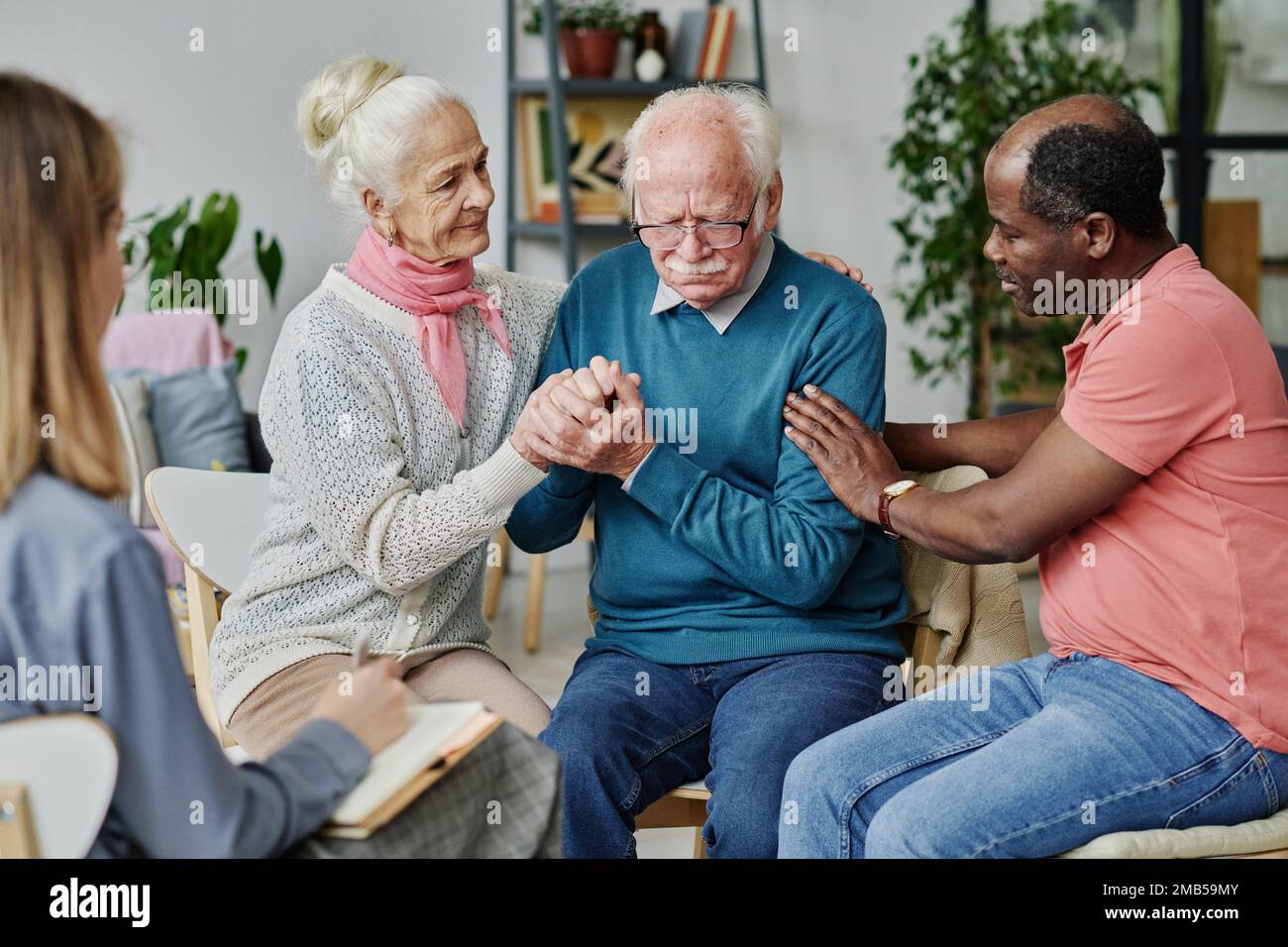 Supporting help hi-res stock photography and images - Alamy