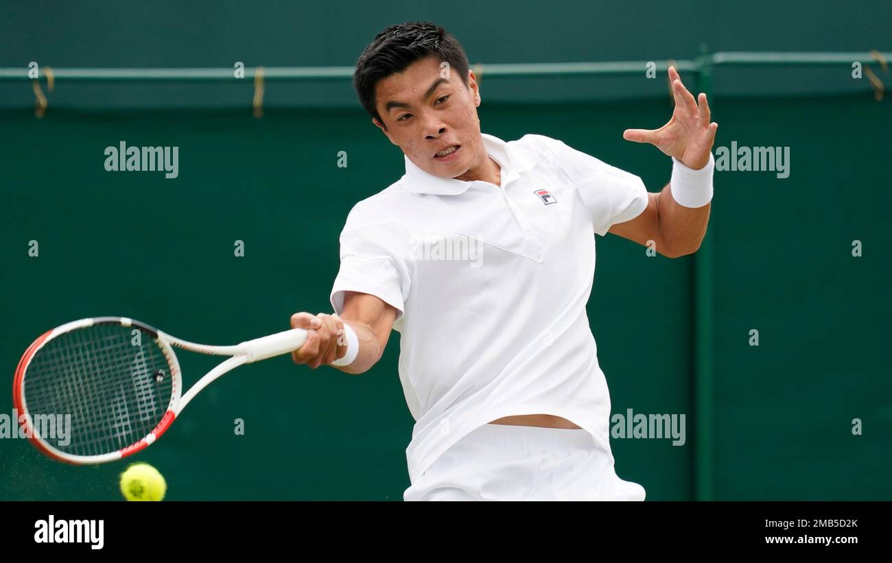 Brandon Nakashima of the US returns to Colombia's Daniel Elahi Galan during  their men's third round singles match on day six of the Wimbledon tennis  championships in London, Saturday, July 2, 2022. (
