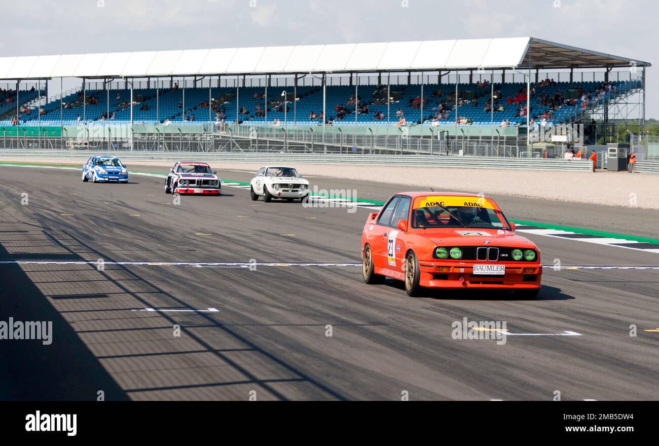 Racing action during the Tony Dron Memorial Trophy For MRL Historic Touring Cars, at the 2022 Silverstone Classic Stock Photo