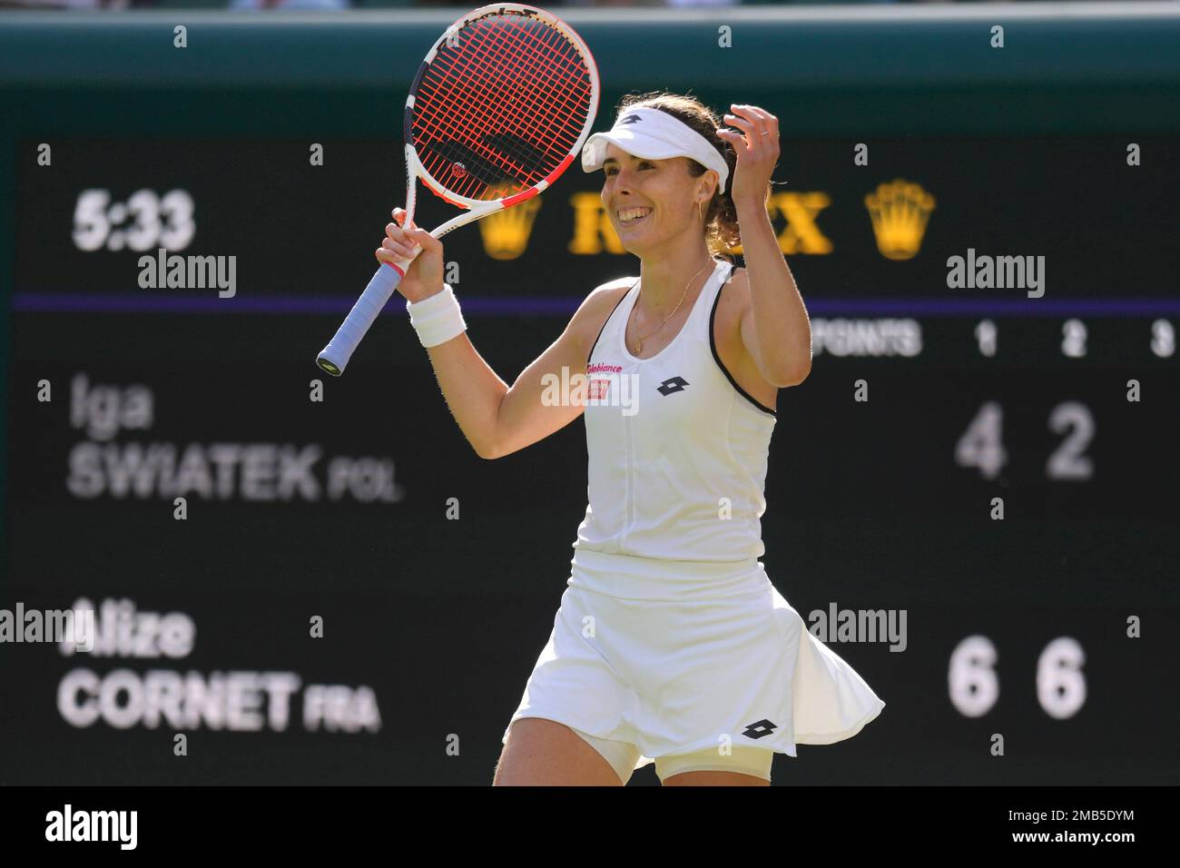 France's Alize celebrates defeating Poland's Iga Swiatek during a third round women's