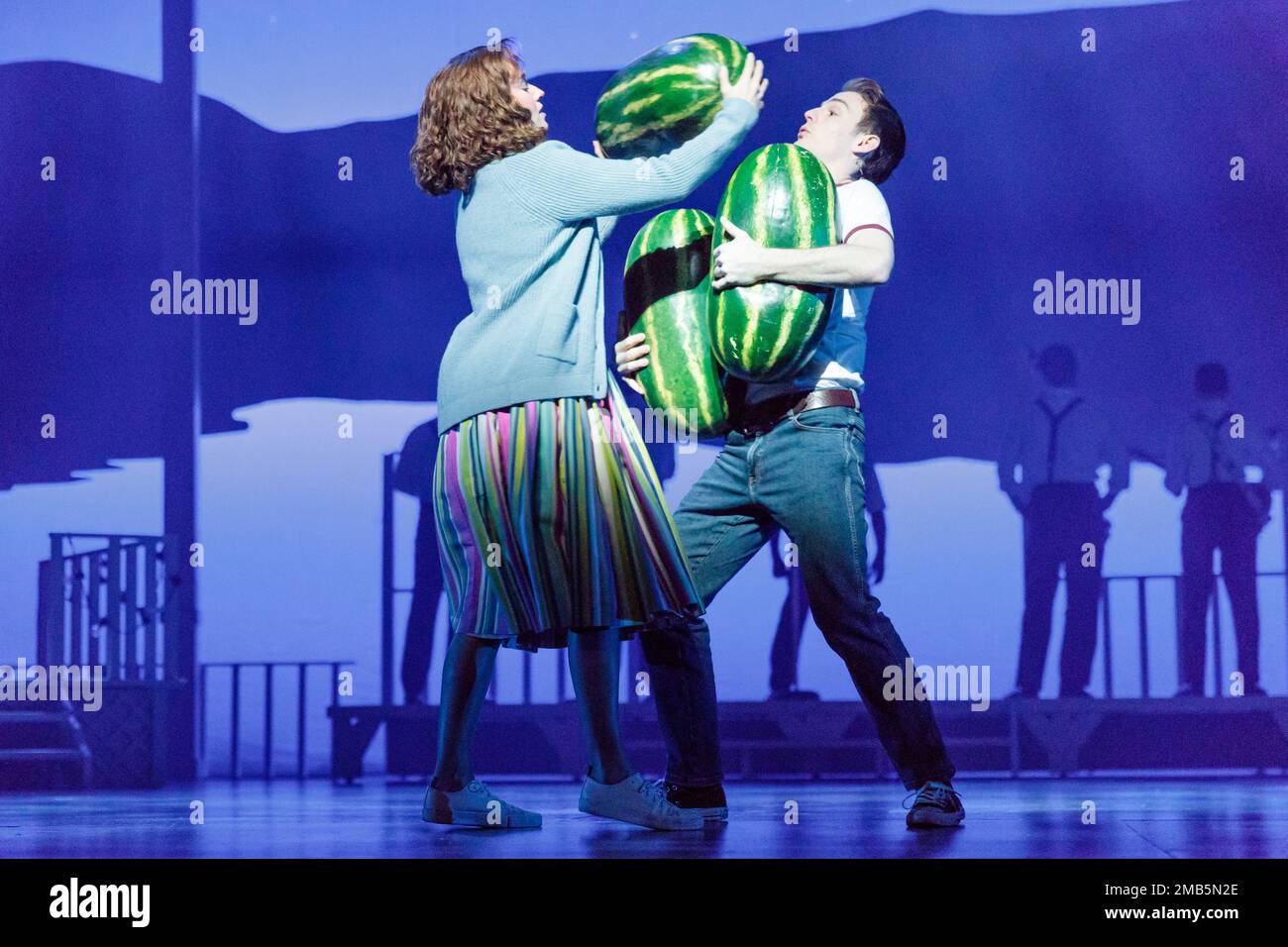 Dominion Theatre, London, UK. 20th January 2023.  Kira Malou (Baby) and Danny Colligan (Billy) re-enact the famous Watermelon scene from Dirty Dancing. Following its record-breaking run last year, Dirty Dancing - The Classic Story On Stage returns to the West End until 29th April. Photo by Amanda Rose/Alamy Live News Stock Photo