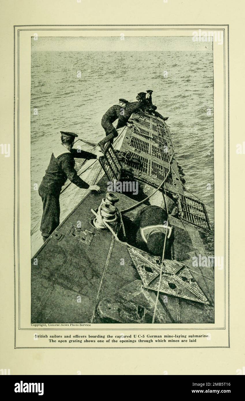 British sailors board the captured U-C-5, German Mine-Laying Submarine from the book The story of the great war; the complete historical records of events to date DIPLOMATIC AND STATE PAPERS by Reynolds, Francis Joseph, 1867-1937; Churchill, Allen Leon; Miller, Francis Trevelyan, 1877-1959; Wood, Leonard, 1860-1927; Knight, Austin Melvin, 1854-1927; Palmer, Frederick, 1873-1958; Simonds, Frank Herbert, 1878-; Ruhl, Arthur Brown, 1876-  Volume V Published 1916 Stock Photo