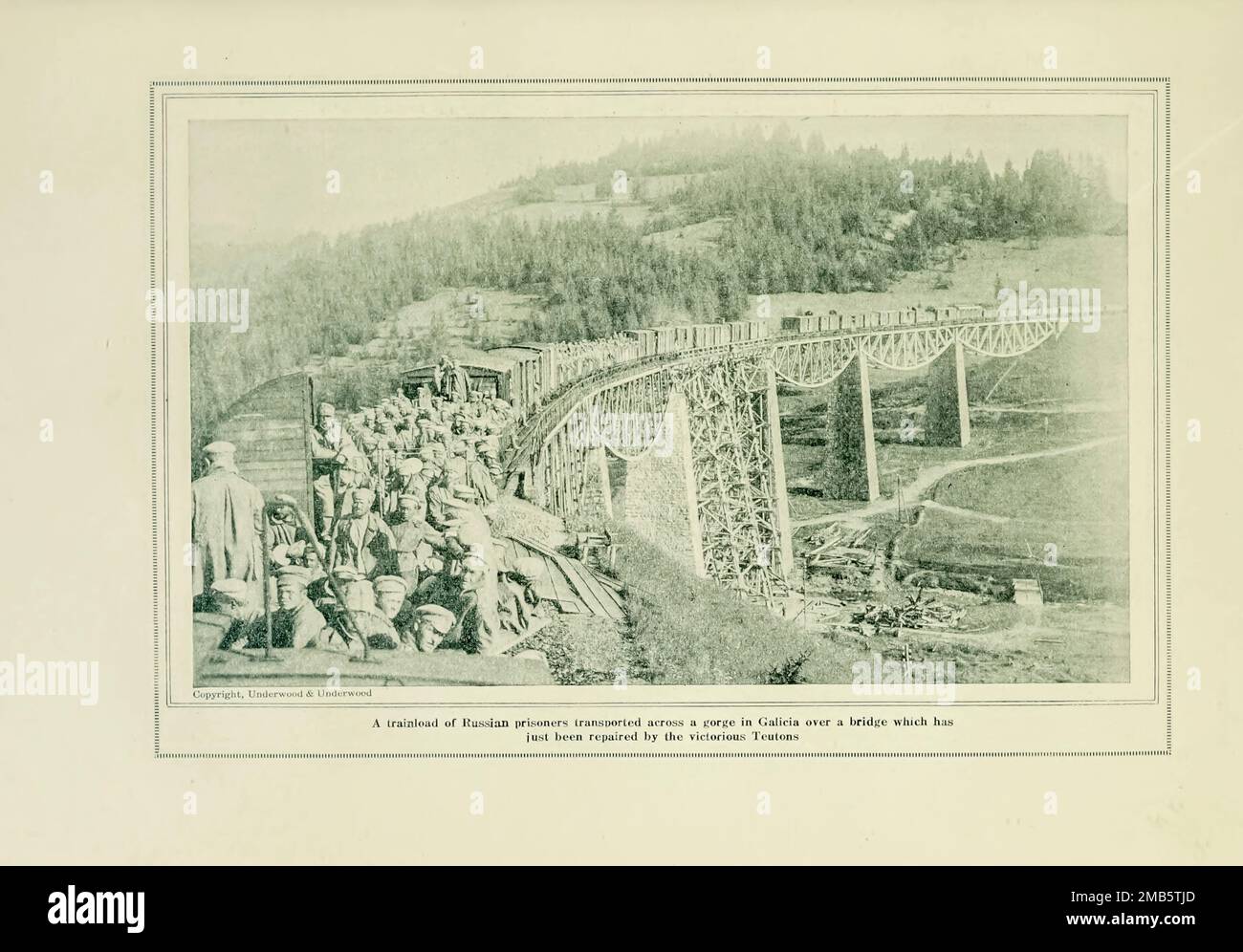 Transporting Russian Prisoners Across a Gorge in Galicia from the book The story of the great war; the complete historical records of events to date DIPLOMATIC AND STATE PAPERS by Reynolds, Francis Joseph, 1867-1937; Churchill, Allen Leon; Miller, Francis Trevelyan, 1877-1959; Wood, Leonard, 1860-1927; Knight, Austin Melvin, 1854-1927; Palmer, Frederick, 1873-1958; Simonds, Frank Herbert, 1878-; Ruhl, Arthur Brown, 1876-  Volume VII Published 1920 Stock Photo