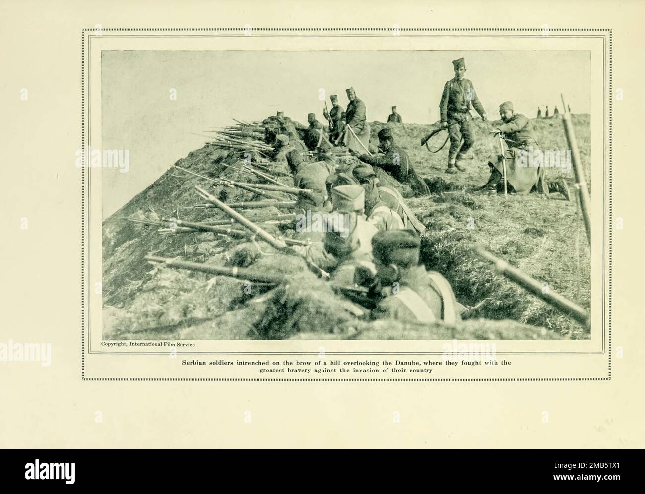 Serbian Soldiers Intrenched on a Hill near the Danube from the book The story of the great war; the complete historical records of events to date DIPLOMATIC AND STATE PAPERS by Reynolds, Francis Joseph, 1867-1937; Churchill, Allen Leon; Miller, Francis Trevelyan, 1877-1959; Wood, Leonard, 1860-1927; Knight, Austin Melvin, 1854-1927; Palmer, Frederick, 1873-1958; Simonds, Frank Herbert, 1878-; Ruhl, Arthur Brown, 1876-  Volume VII Published 1920 Stock Photo