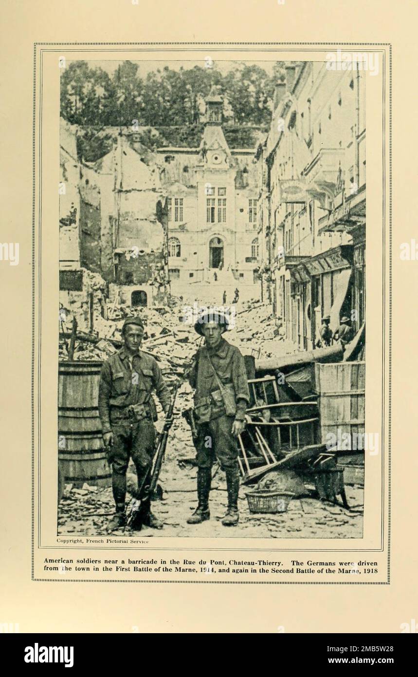 Chateau-Thierry with American soldiers on guard from the book The story of the great war; the complete historical records of events to date DIPLOMATIC AND STATE PAPERS by Reynolds, Francis Joseph, 1867-1937; Churchill, Allen Leon; Miller, Francis Trevelyan, 1877-1959; Wood, Leonard, 1860-1927; Knight, Austin Melvin, 1854-1927; Palmer, Frederick, 1873-1958; Simonds, Frank Herbert, 1878-; Ruhl, Arthur Brown, 1876-  Volume VII Published 1920 Stock Photo
