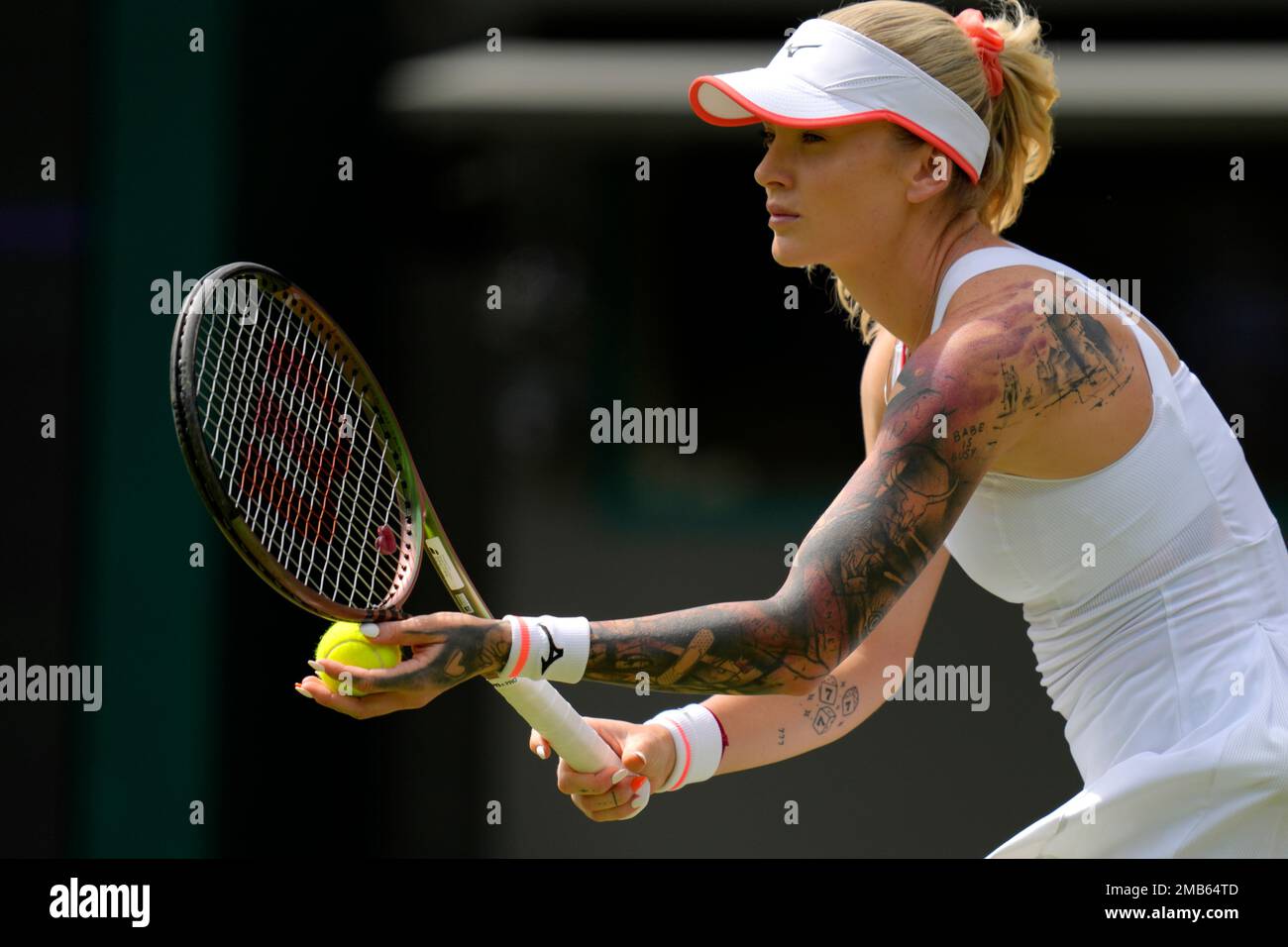 Tereza Martincova of the Czech Republic prepares to serve to Karolina  Pliskova of the Czech Republic in a singles tennis match on day three of  the Wimbledon tennis championships in London, Wednesday,