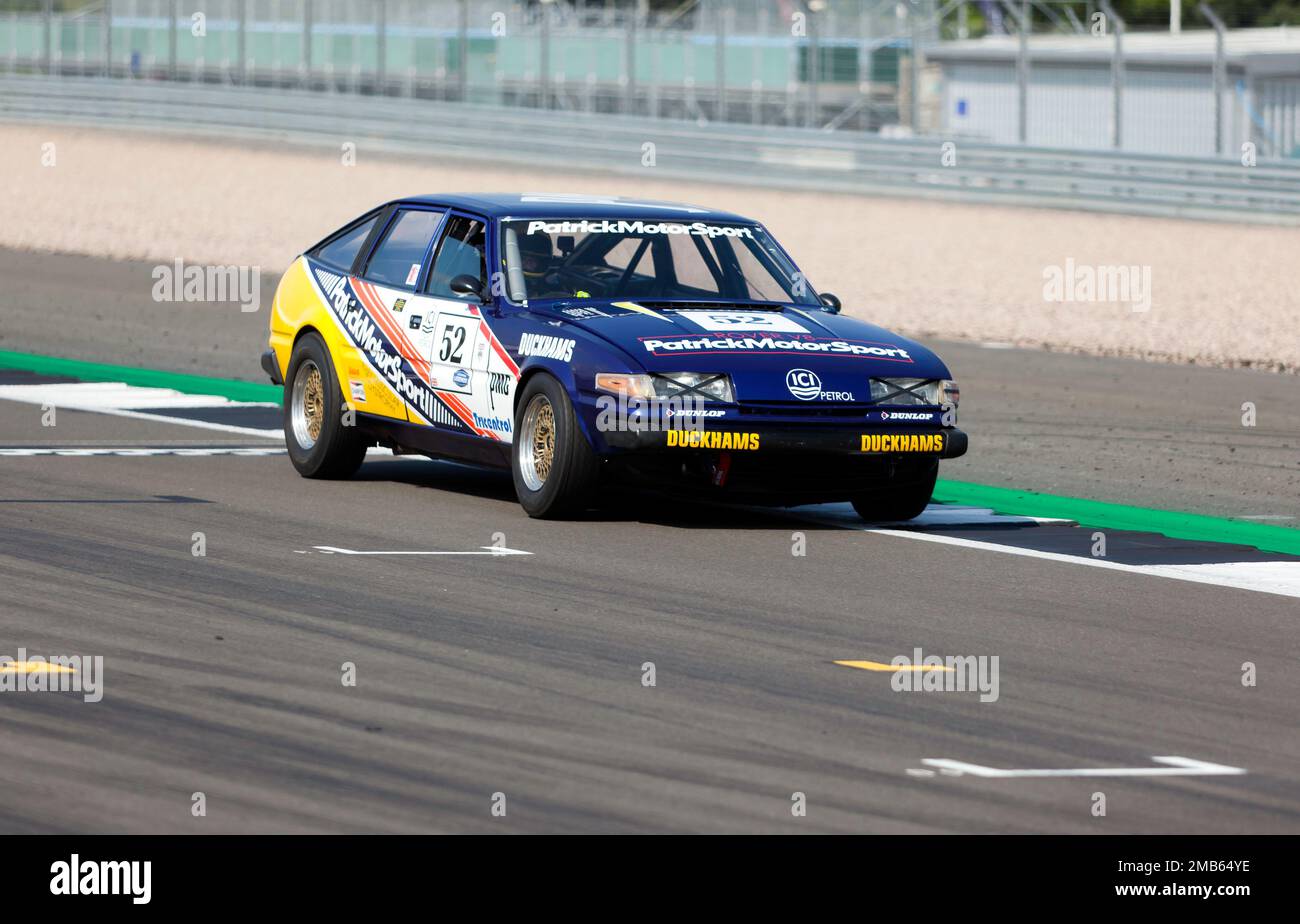 Robert Oldershaw (Snr), driving his Blue and Yellow, 1981, Rover SD1, during the Tony Dron Memorial Trophy For MRL Historic Touring Cars. Stock Photo