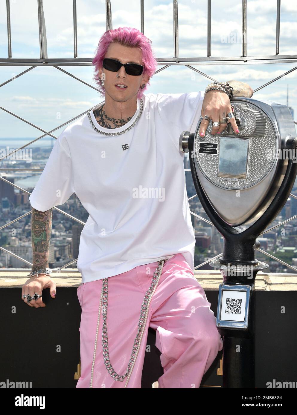Machine Gun Kelly participates in a ceremonial lighting of the Empire State Building to