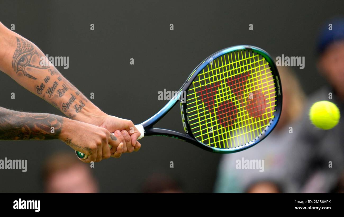 Australias Nick Kyrgios returns the ball during the singles tennis match against Britains Paul Jubb on day two of the Wimbledon tennis championships in London, Tuesday, June 28, 2022