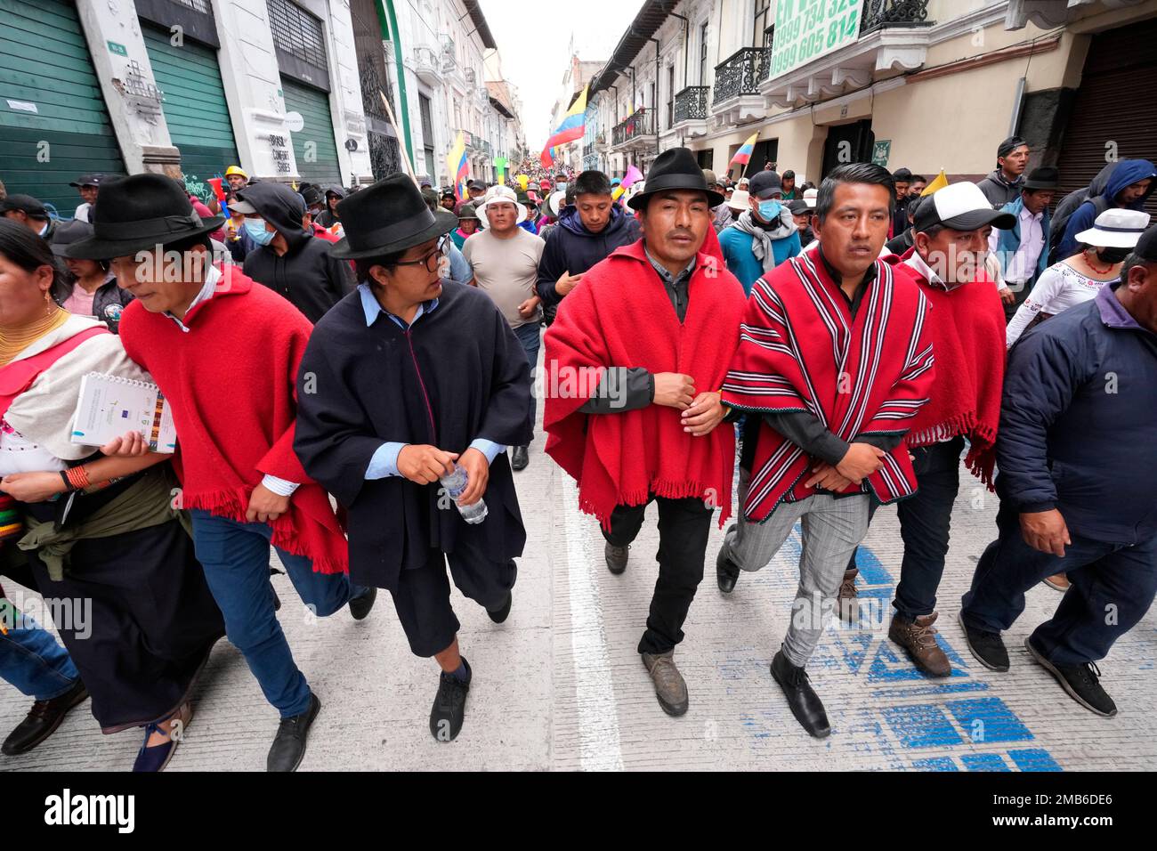 Indigenous leader Leonidas Iza, center right, leads a march towards