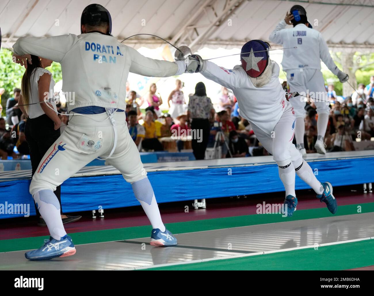 Chile's Rodrigo Gonzalez, right, fences Panama's Arturo Dorati fence