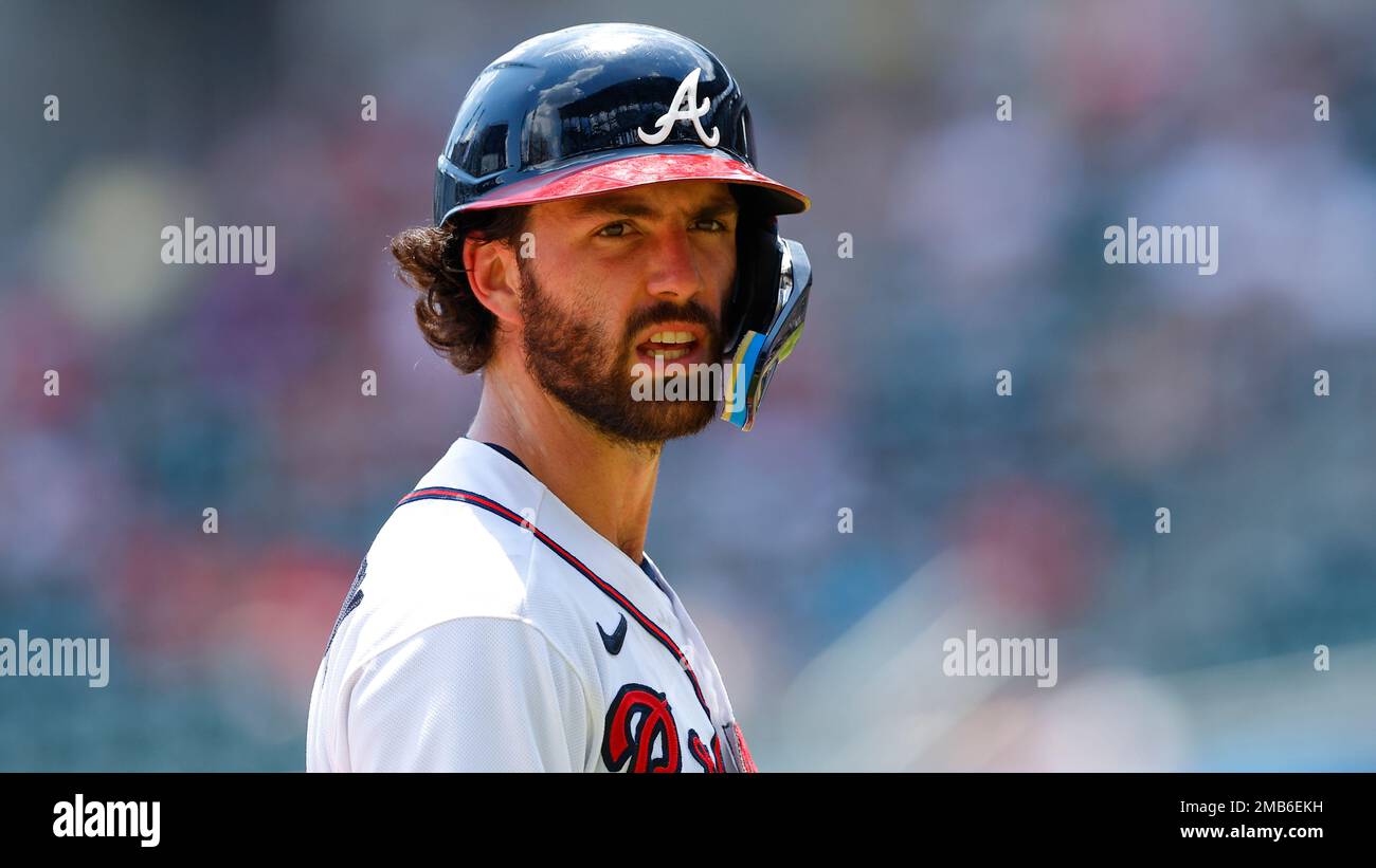 Dansby Swanson #7 of the Atlanta Braves looks on from third base during a  pitching change in the sixth inning during MLB g…