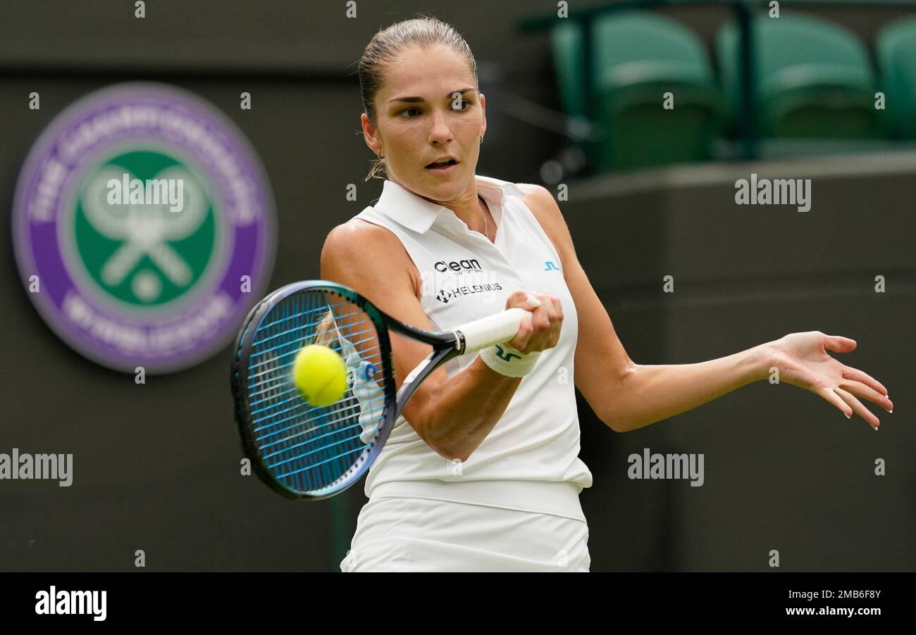 Sweden's Mirjam Bjorklund returns the ball to Tunisia's Ons Jabeur during  their women's singles tennis match on day one of the Wimbledon tennis  championships in London, Monday, June 27, 2022. (AP Photo/Alberto