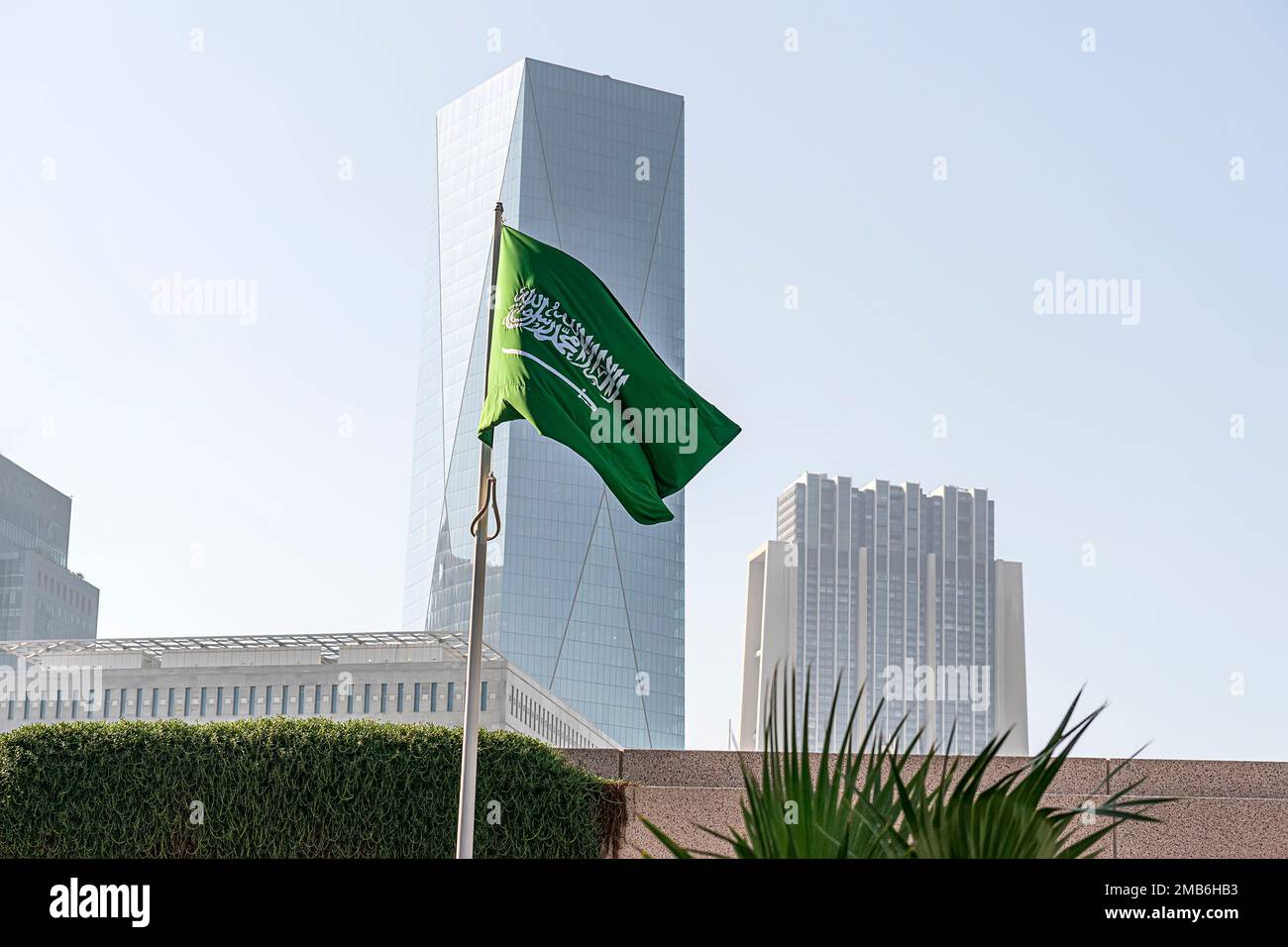 flag of Saudi Arabia against the background of a tall building, Stock Photo