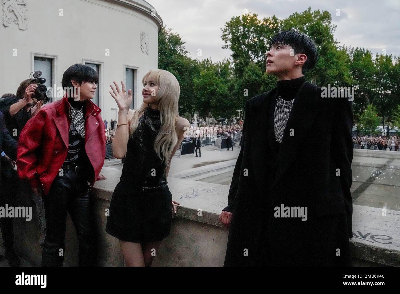 V, from left, Lisa, and Park Bo-gum greet crowds before the Celine men's  Spring Summer 2023 collection presented in Paris, France, Sunday, June 26,  2022. (AP Photo/Francois Mori Stock Photo - Alamy